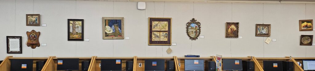 A photo of Sandy Dales art hung on the walls in the library